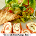 Delicious chicken lettuce wraps with colorful vegetables and flavorful sauce."
